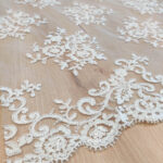 Lace with sequins and cording