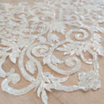 Hand beaded motif lace