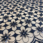 Embroided lace with daizes