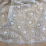 Lace with holes