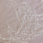 Embroided lace with beads