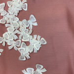 Motif bow off white