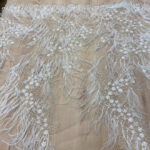 Δαντέλα κεντημένη  με φτερά