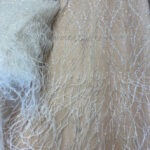 Δαντέλα κεντημένη με φτερά